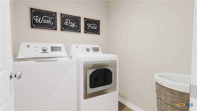 laundry area with washer and dryer