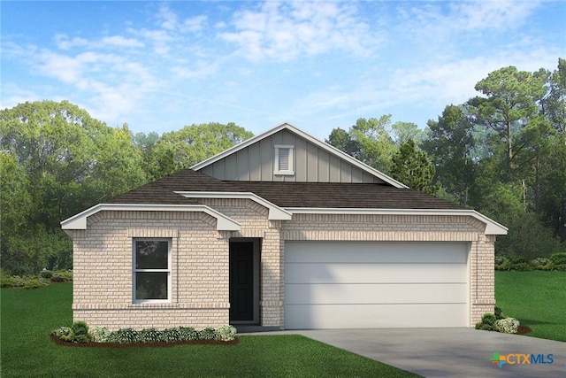 view of front of house featuring a garage and a front lawn