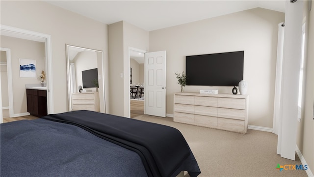 carpeted bedroom featuring ensuite bathroom