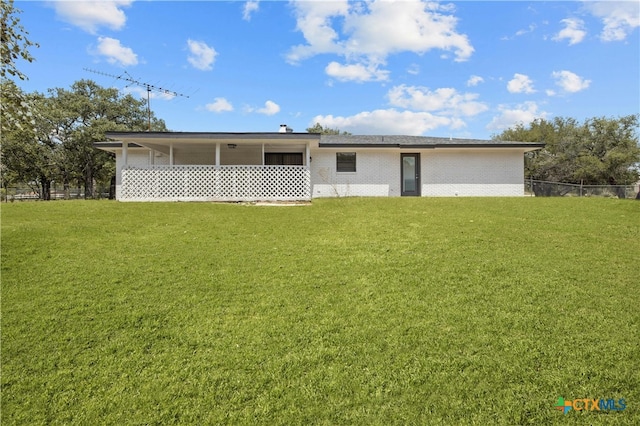 view of front of home with a front lawn