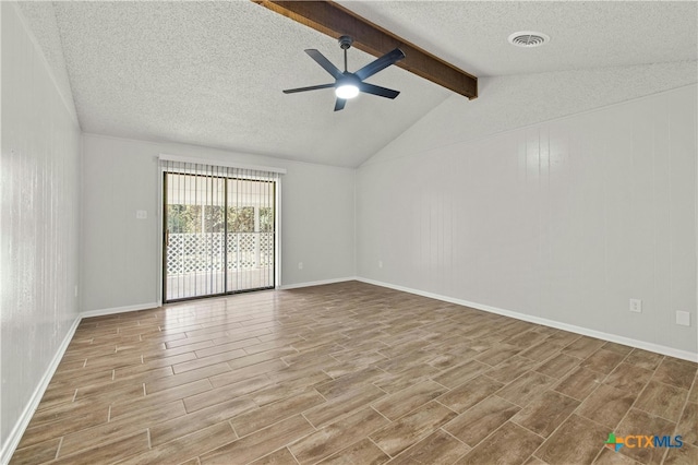 unfurnished room with lofted ceiling with beams, light wood-type flooring, a textured ceiling, and ceiling fan