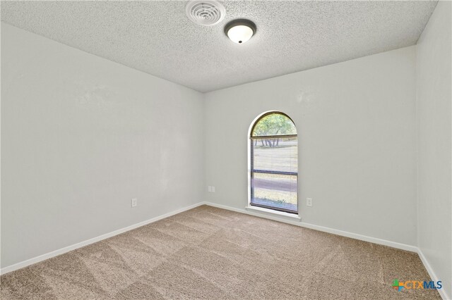 bathroom featuring a textured ceiling, hardwood / wood-style floors, vanity, toilet, and tile walls