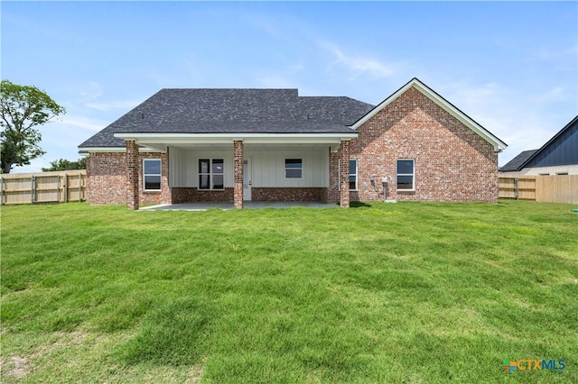 1811 Ember Dr, Temple, TX 76502 - back of house featuring brick siding, a patio, and roof with shingles