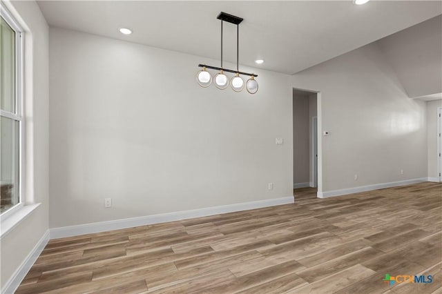 1811 Ember Dr, Temple, TX 76502 - unfurnished dining area with light wood-type flooring and recessed lighting