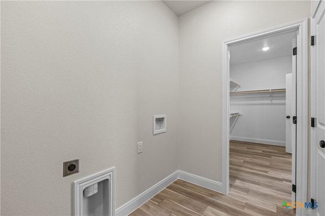 1811 Ember Dr, Temple, TX 76502 - laundry area featuring hookup for an electric dryer, wood finished floors, and washer hookup