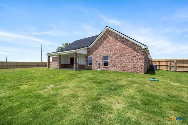 1811 Ember Dr, Temple, TX 76502 - back of house with brick siding and a fenced backyard