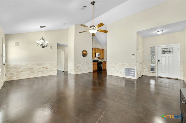 unfurnished living room featuring finished concrete floors, visible vents, and ceiling fan with notable chandelier