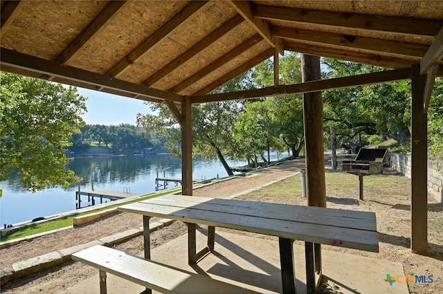 exterior space with a water view