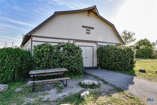 exterior space with an outbuilding