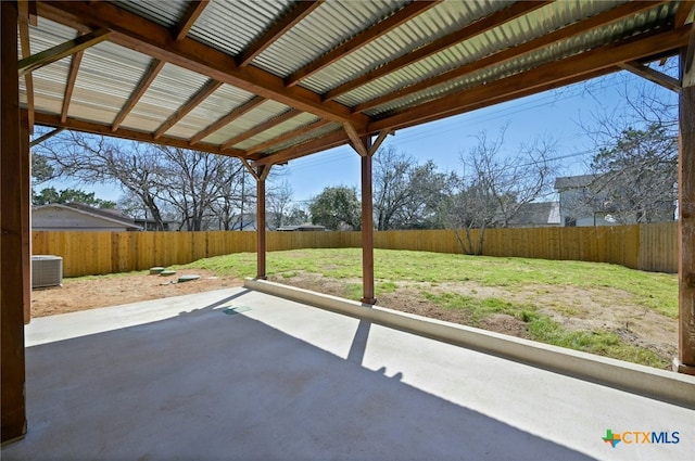 view of patio with a fenced backyard and central AC