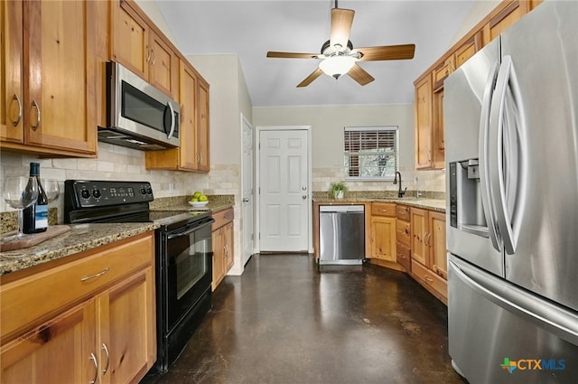 kitchen featuring brown cabinets, finished concrete flooring, stainless steel appliances, backsplash, and light stone countertops