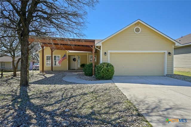 view of front of property with a garage and driveway