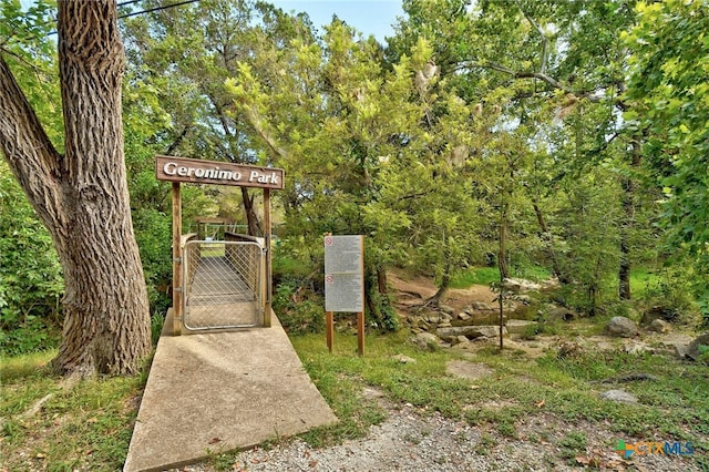 surrounding community featuring a gate