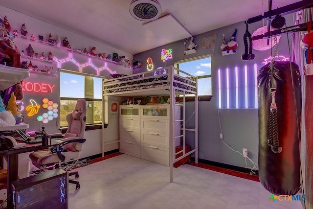 bedroom featuring tile patterned floors and visible vents