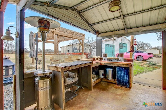 view of patio featuring outdoor dry bar