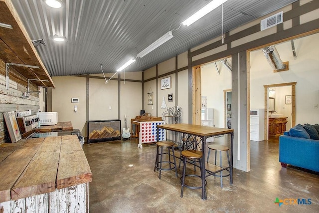 kitchen with visible vents and finished concrete flooring