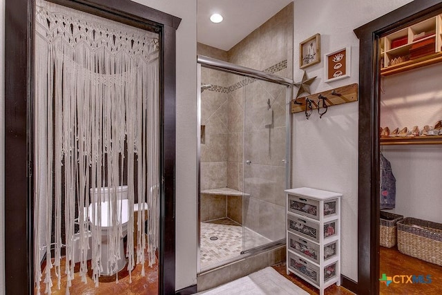 bathroom with a stall shower