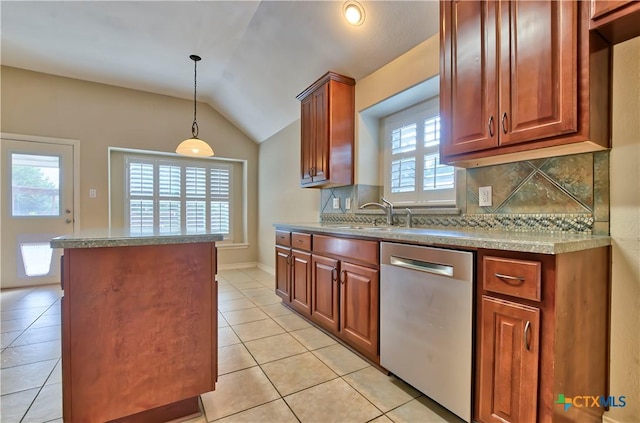 kitchen with light tile patterned floors, backsplash, decorative light fixtures, vaulted ceiling, and stainless steel dishwasher