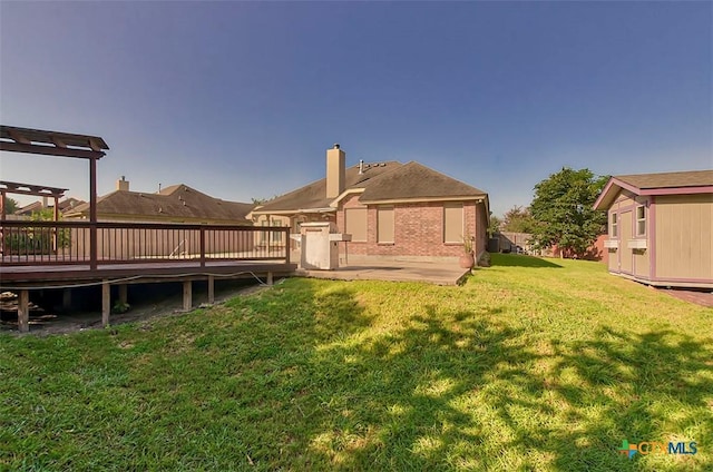 view of yard with a pergola and a wooden deck