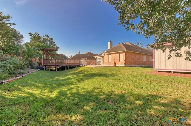 view of yard featuring a deck