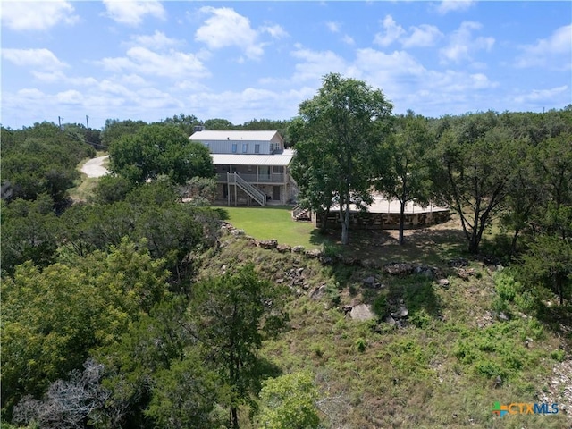 514 Eden Ranch Dr, Canyon Lake, TX 78133 - view from above of property with a heavily wooded area