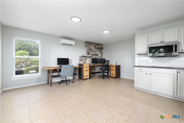 514 Eden Ranch Dr, Canyon Lake, TX 78133 - home office featuring a wall unit AC and light tile patterned floors