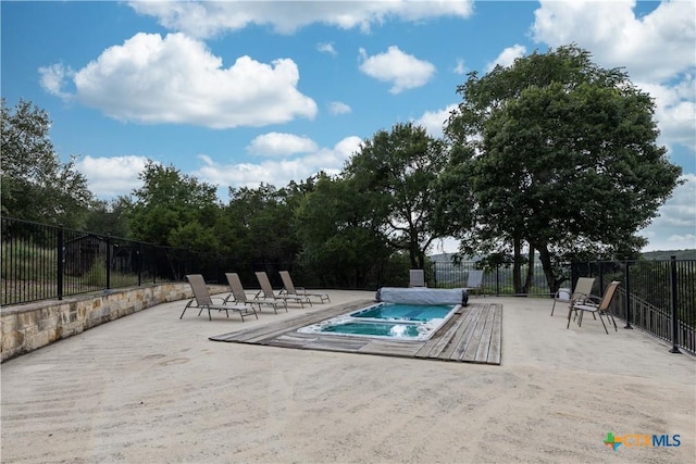 514 Eden Ranch Dr, Canyon Lake, TX 78133 - view of swimming pool featuring a jacuzzi and a patio area