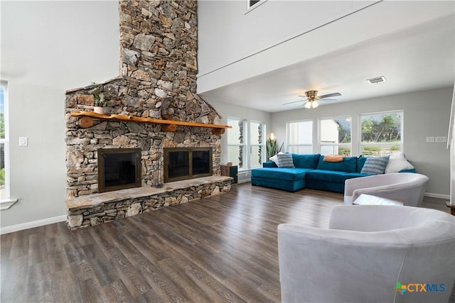 514 Eden Ranch Dr, Canyon Lake, TX 78133 - living room featuring a fireplace, wood finished floors, and ceiling fan