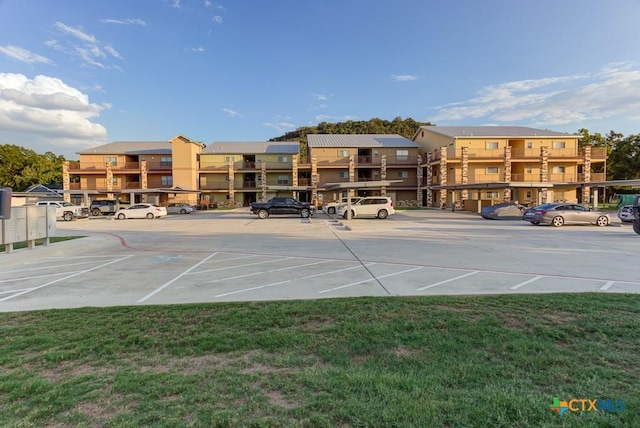 540 River Run Unit 204, New Braunfels, TX 78132 - view of tennis court featuring a residential view