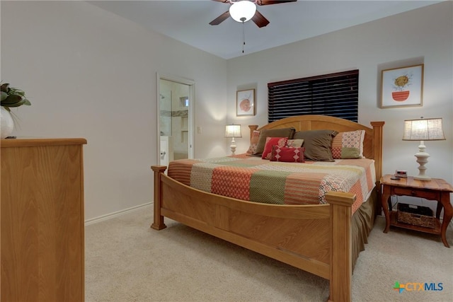 540 River Run Unit 204, New Braunfels, TX 78132 - bedroom featuring light carpet, ceiling fan, and connected bathroom