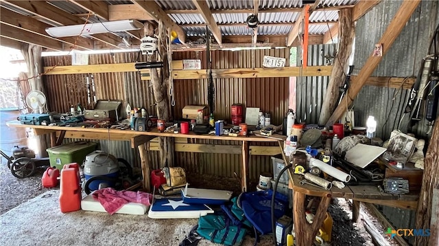 miscellaneous room featuring a workshop area