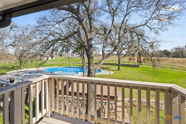 deck featuring a lawn