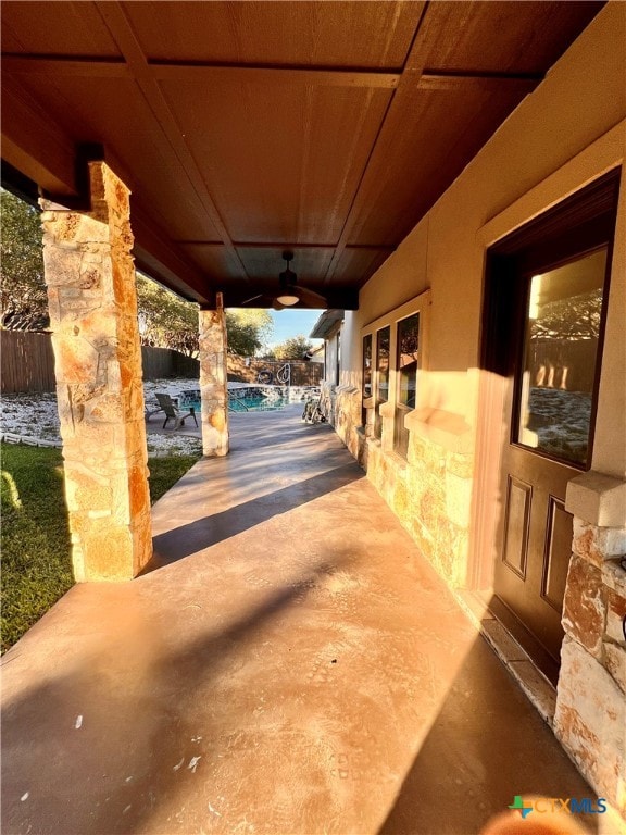 view of patio / terrace featuring ceiling fan