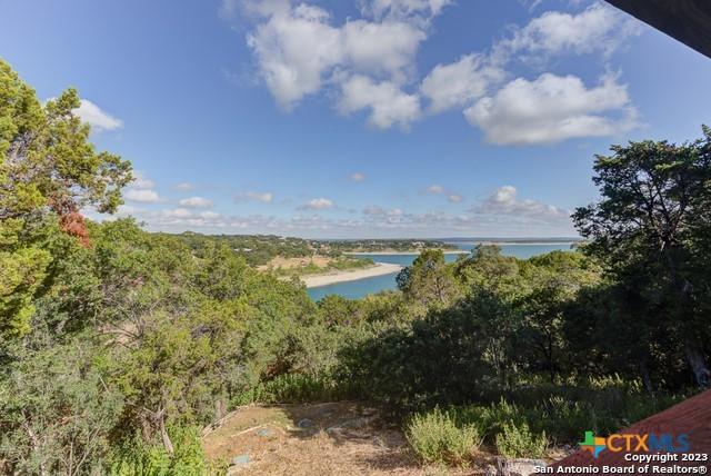 1254 Village Shore Dr, Canyon Lake, TX 78133 - water view featuring a heavily wooded area