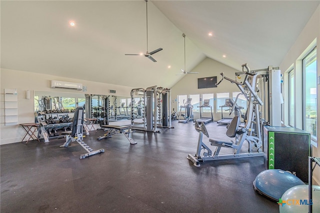 gym with ceiling fan, a healthy amount of sunlight, a wall unit AC, and high vaulted ceiling