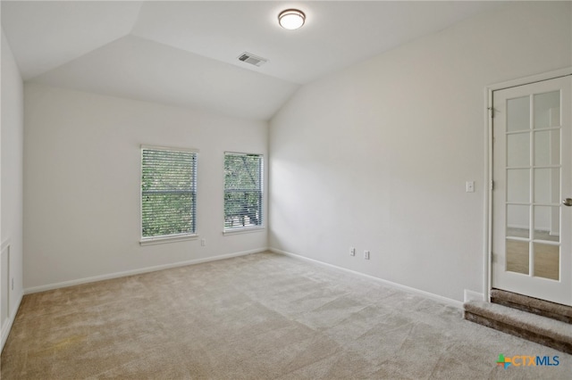 407 Misty Morn Ln, Cedar Park, TX 78613 - carpeted empty room featuring visible vents, vaulted ceiling, and baseboards