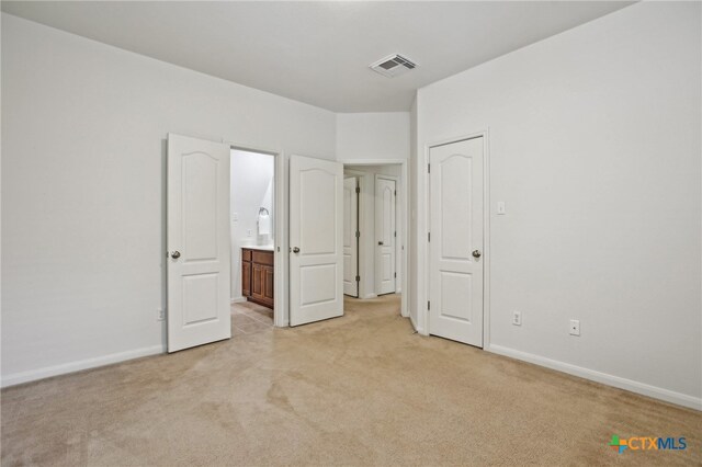407 Misty Morn Ln, Cedar Park, TX 78613 - unfurnished bedroom with light colored carpet, baseboards, and visible vents
