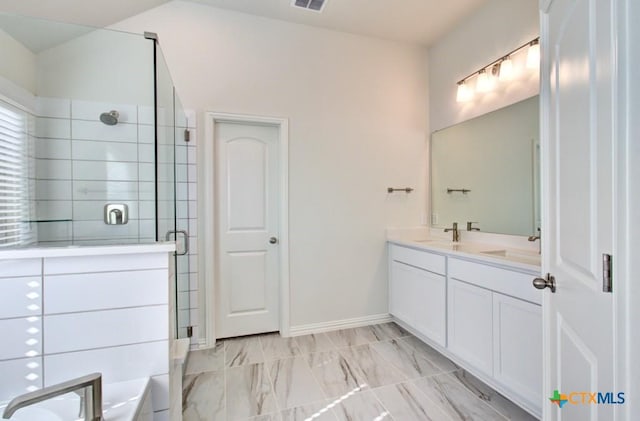 771 Navarro St, New Braunfels, TX 78132 - full bath featuring double vanity, a shower stall, a tub to relax in, and marble look tiles
