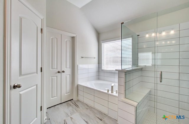 771 Navarro St, New Braunfels, TX 78132 - bathroom with a bath, a stall shower, marble finish floors, and a closet