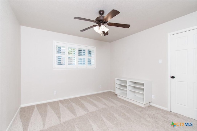 4101 Hickory Rd, Temple, TX 76502 - unfurnished bedroom with carpet floors, baseboards, and a ceiling fan