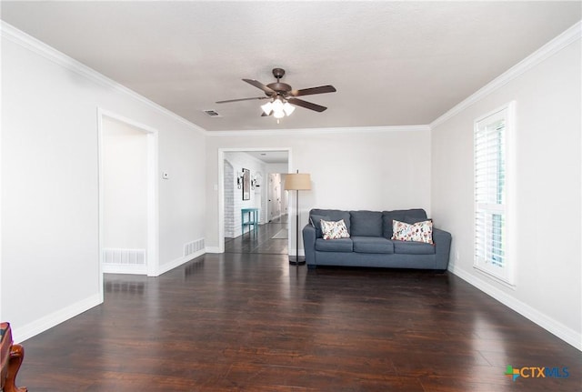 4101 Hickory Rd, Temple, TX 76502 - living area with wood finished floors, ceiling fan, ornamental molding, and baseboards