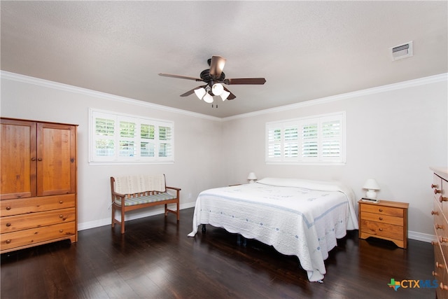 bedroom featuring dark wood-type flooring, ceiling fan, and crown molding