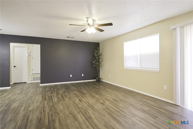 4408 Secretariat Dr, Killeen, TX 76549 - unfurnished room featuring a ceiling fan, a textured ceiling, wood finished floors, and baseboards