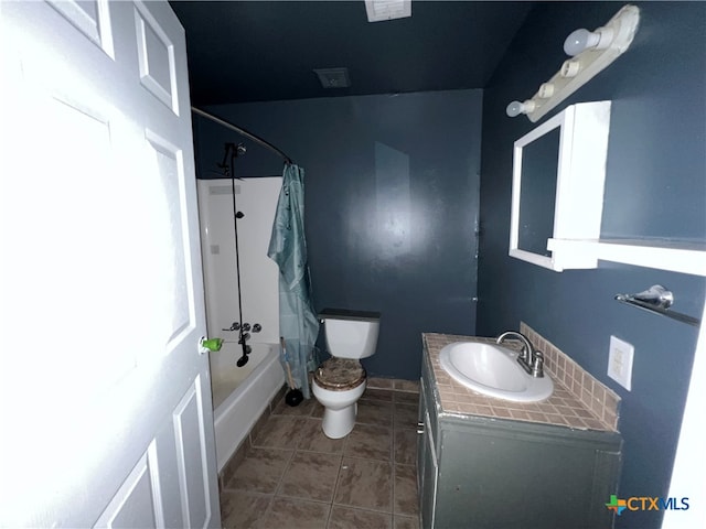 full bathroom with tile patterned floors, vanity, shower / bathtub combination with curtain, and toilet