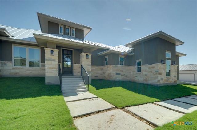 view of front facade with a front lawn