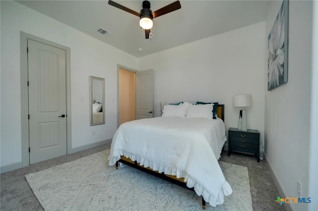 carpeted bedroom featuring ceiling fan