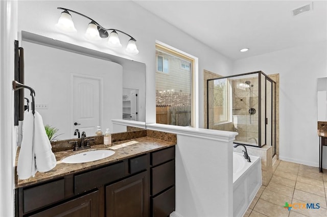 full bathroom with vanity, visible vents, a stall shower, tile patterned floors, and a bath