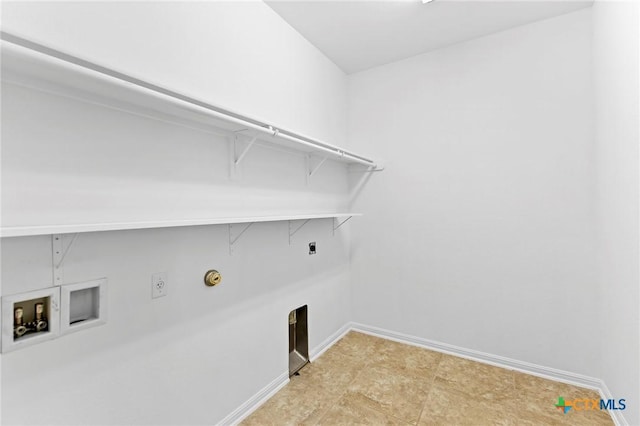 laundry area with laundry area, hookup for a washing machine, electric dryer hookup, and gas dryer hookup