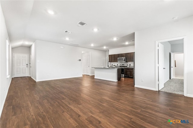 unfurnished living room featuring dark hardwood / wood-style flooring