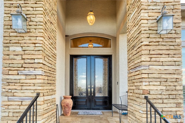 entrance to property with french doors